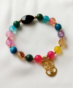 Pulsera en piedras naturales de Agata multicolor y Onix – Dije Precolombino Hombre Pico de Ave de la cultura indígena del Cauca.