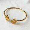Pulsera Precolombina de aro Decoración típica Calima. Pieza con baño de oro de 24k.