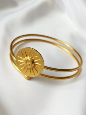 La evolución de mi marca Gloria Noreña arte y joyas pulsera de oro con dije de sol argentino