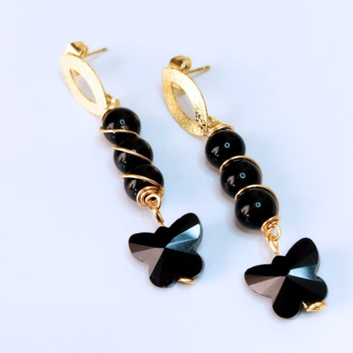 ARETES NEGROS - GLORIA NOREÑA